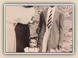 Picture taken at Jack's first Virgo party, Sept. 1949. (left to right
are) Edna Jane Hall Robbins, Sarah Hall Robbins Conard, Houston Thomas Hall (born Sept. 1, 1866) In front is Jack.